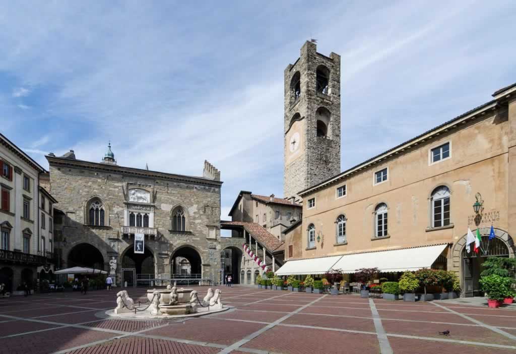 Bergamo Italu Piazza Vecchia panoramic view with the tower and the central fountain