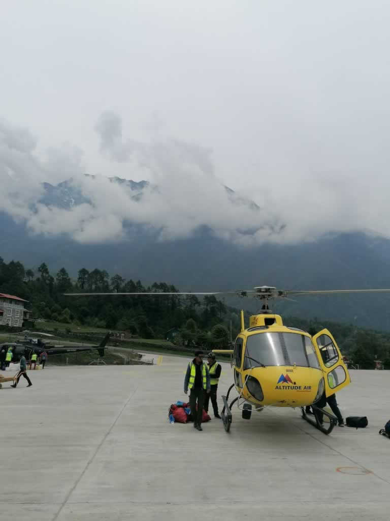Yellow Helicopter at Lukla Heliport