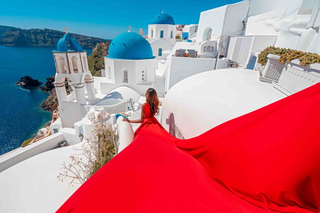 Santorini red flying dress photo shoot 